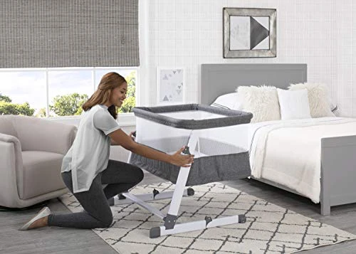 Delta Children Simmons Kids Room2Grow 2-in-1 Newborn Bedside Bassinet & Infant Sleeper - Height Adjustable Portable Crib With Wheels & Airflow Mesh, Grey Tweed - Image 4