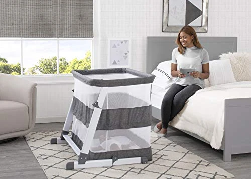 Delta Children Simmons Kids Room2Grow 2-in-1 Newborn Bedside Bassinet & Infant Sleeper - Height Adjustable Portable Crib With Wheels & Airflow Mesh, Grey Tweed - Image 5