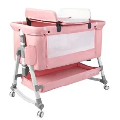 HARPPA Baby Bassinet Bedside Sleeper (Diaper Changing Station + Mosquito Net Included), Adjustable Bedside Crib With Storage, Converts To Cradle And Cosleeper, Portable, Easy Folding. Pink