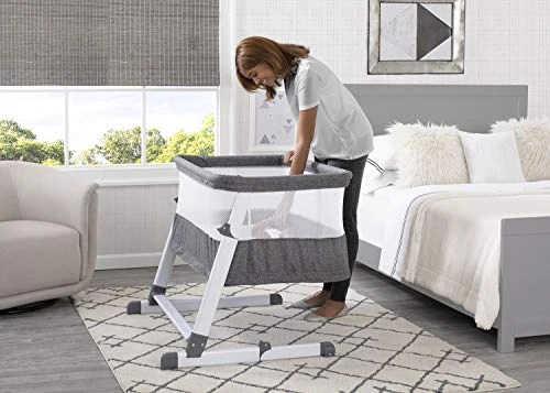 Delta Children Simmons Kids Room2Grow 2-in-1 Newborn Bedside Bassinet & Infant Sleeper - Height Adjustable Portable Crib With Wheels & Airflow Mesh, Grey Tweed - Image 3